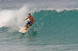 Foto: A longboard surfer enjoys the glassy waves in Phuket A longboard surfer enjoys the glassy waves in Phuket