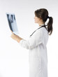 young and nice doctor watching a patient x-ray