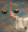 Arm of Lady Justice holding scales Arm of Lady Justice holding scales