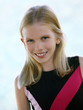 Happy smiling blond girl with blue eyes