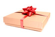 Golden box with red ribbon isolated on a white background