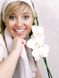 Close up of beautiful woman with white orchid
