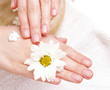 female applying cream to her hands