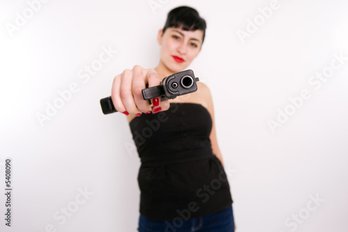 Photo: Woman with Gun Woman with Gun