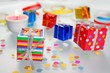 Colorful gifts with shining ribbons on white background
