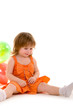 happy girl playing with colorful balloons
