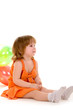 happy girl playing with colorful balloons