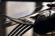 close-up of silver spoon, fork and knife