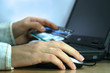 Woman is buying via Internet.