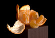Cleared mandarine on a black background. Cleared mandarine on a black background.