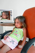 Small beautiful girl with computer