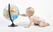 Child playing with globe Child playing with globe
