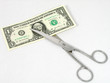 Schere mit 1 Dollar Schein