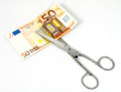 Schere mit 50 Euro Schein