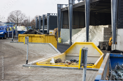 Photo: Containers with separated waste bricks and glass to recycle Containers with separated waste bricks and glass to recycle