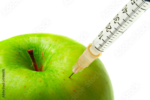 apple and syringe isolated on white background
