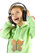 Little fun girl listening music in headphones. Isolate on white.