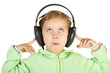 Surprised girl listening music with headphones