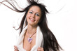 The beautiful brunette with in flying hair The beautiful brunette with in flying hair