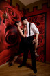 couple in love dancing Latino dance at the nightlub.