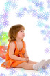 happy girl playing with colorful balloons