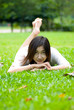 Women laying on the grass