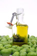 Extra virgin olive oil with green olives