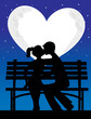A silhouette of a couple with a heart shaped moon behind them A silhouette of a couple with a heart shaped moon behind them