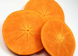 slices of fuyu persimmons, showing off their star pattern