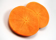 slices of fuyu persimmon with internal star pattern.