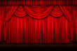 Large red stage curtains over wooden floor Large red stage curtains over wooden floor