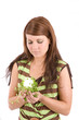 Woman holding a burning light bulb