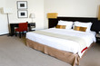 Image of a nice hotel bedroom.