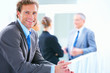 Mature businessman smiling