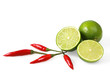 Limes and chilli peppers, isolated on white.  