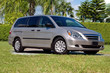 Family Van - front-right shot of a silver minivan