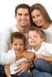 Modern, attractive young family hugging and laughing together