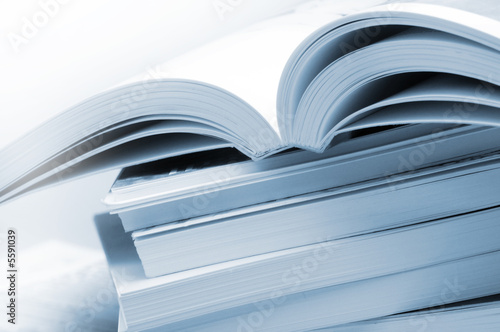 Photo: Stack of brochures in blue toned Stack of brochures in blue toned