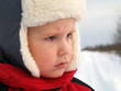 tot mistrustful looks at unacquainted object