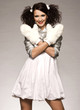 beautiful brunette winter girl wearing furry gloves 