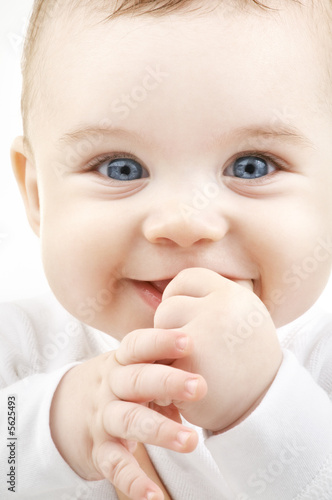 bright closeup portrait of adorable baby