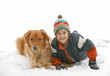 Boy Playing with Dog in Snow