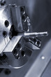 The clamped screw in a cartridge of a lathe