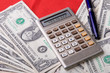 Money background - USA dollars and calculator