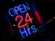 pink & blue neon Open 24 hours sign at night