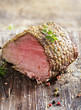 juicy roast beef covered in herbs