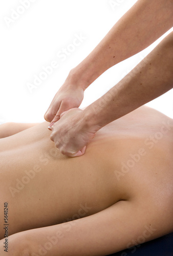 Massage therapist giving a massage Massage therapist giving a massage