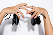 Detail of the hands with castanets of a flamenco dancer Detail of the hands with castanets of a flamenco dancer