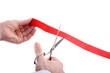 cutting the red ribbon- beggining of a new business venture
