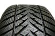 Brand new tire on white background